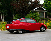 AUT 33 RK0170 03
2000 Honda Insight Hybrid Red 3/4 Rear View On Pavement By House