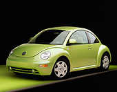 AUT 33 RK0191 09
2000 Volkswagen New Beetle Green Front 3/4 View On Green Floor Gray Line Studio