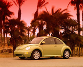 AUT 33 RK0199 08
2000 Volkswagen New Beetle Green 3/4 Front View On Pavement By Palm Trees