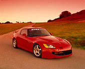 AUT 33 RK0265 02
2000 Honda S2000 Red 3/4 Front View On Pavement By Grass Hills Filtered
