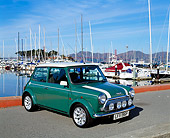 AUT 33 RK0298 03
2000 Cooper Sports Pack Green With White Stripes 3/4 Front View On Pavement By Harbor