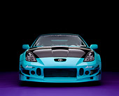 AUT 33 RK0346 01
2000 Toyota Celica Teal Head On Shot On Purple Floor Studio