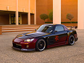 AUT 33 RK0353 01
2000 Honda S2000 Raspberry And Black 3/4 Side View On Pavement