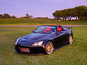 AUT 33 RK0369 01
2000 Honda S2000 Convertible Black 3/4 Front View On Grass