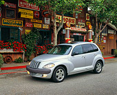 AUT 34 RK0062 03
2001 Chrysler PT Cruiser Silver 3/4 Side View On Pavement By Store