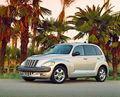AUT 34 RK0066 09
2001 Chrysler PT Cruiser Silver 3/4 Side View On Pavement By Palm Trees Filtered