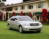 AUT 34 RK0107 01
2001 Lexus LS430 Silver 3/4 Front View On Grass By Building