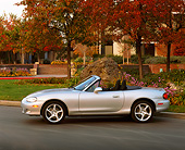 AUT 34 RK0160 05
2001 Mazda Miata Convertible Silver Profile View On Pavement By Trees