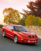 AUT 34 RK0168 02
2001 Pontiac Firebird Trans Am Sunset Orange Slanted Front 3/4 View On Pavement Filtered