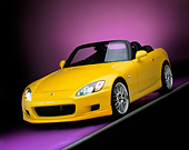 AUT 34 RK0339 02
2001 Honda S2000 Convertible Yellow 3/4 Front View On Gray Line Purple Floor And Lighting Studio