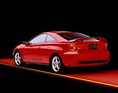 AUT 34 RK0027 03
2001 Toyota Celica Red 3/4 Rear View On Red Floor Yellow Line Studio