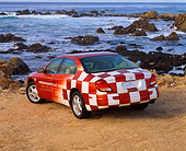 AUT 34 RK0047 01
2001 Oldsmobile Aurora Indy 500 Pace Car 3/4 Rear View On Sand By Ocean