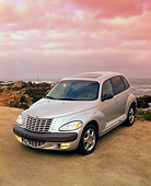 AUT 34 RK0051 02
2001 Chrysler PT Cruiser Silver 3/4 Front View On Sand Hill Filtered