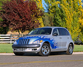 AUT 34 RK0130 01
2001 Chrysler PT Cruiser Silver Blue Flames 3/4 Front View On Pavement