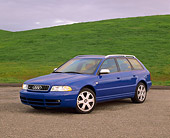 AUT 34 RK0238 01
2001 Audi S4 Avant Blue 3/4 Front View On Pavement By Grass Hills Gray Clouds