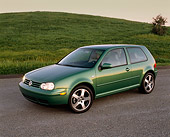 AUT 34 RK0250 03
2001 VW GTI GLS 1.8 T Green Side 3/4 View On Pavement By Grass Hill At Dusk