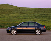 AUT 34 RK0268 03
2001 Volkswagen Jetta GLS 1.8T Blue Profile View On Pavement By Grass Hills At Dusk