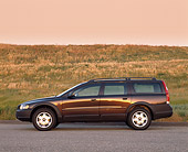 AUT 34 RK0284 03
2001 Volvo V70 XC Brown Profile View On Pavement By Grass Hill At Dusk