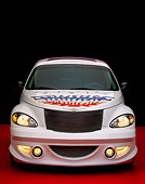 AUT 34 RK0299 03
2001 PT Cruiser White With Flames And Stars Head On Red Floor Studio