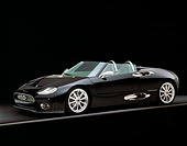 AUT 34 RK0325 10
2001 Spyker C8 Spyder Black Side 3/4 View On Black Floor Gray Line Studio