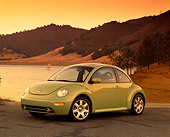 AUT 34 RK0332 05
2001 Volkswagen New Beetle GLX Turbo Green 3/4 Front View On Pavement By Water Filtered