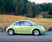 AUT 34 RK0334 02
2001 Volkswagen New Beetle GLX Turbo Green Profile View On Pavement By Dry Grass