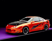 AUT 34 RK0388 01
2001 Acura Integra Orange Custom 3/4 Front View Studio