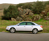 AUT 35 RK0145 01
2002 Audi A4 3.0 Quattro MT6 Silver Profile On Pavement By Rocks And Trees