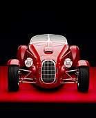 AUT 35 RK0189 07
2002 Torpedo Roadster Red Head On Shot On Red Floor Studio