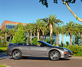AUT 35 RK0219 03
2002 Mitsubishi Eclipse GTS Spyder Gray Low 3/4 Side View By Palm Trees And Building