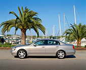 AUT 35 RK0241 04
2002 Infiniti Q45 Luxury Sedan Silver Profile View On Pavement By Harbor