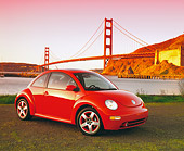AUT 35 RK0242 14
2002 VW New Beetle GLS Turbo Orange 3/4 Side View By SF Bridge Filtered