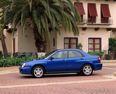 AUT 35 RK0063 01
2002 Subaru WRX Impreza Blue Profile View By Spanish Building