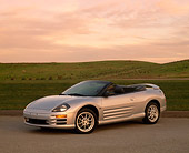 AUT 35 RK0087 04
2002 Mitsubishi Eclipse Spyder GT Silver 3/4 Side View On Pavement By Grass Filtered