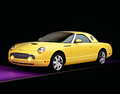 AUT 35 RK0107 02
2002 Ford Thunderbird Convertible Yellow 3/4 Side View On Purple Floor Gray Line Studio