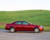 AUT 35 RK0119 02
2002 Cadillac CTS Burgundy Profile On Pavement By Grass Hill