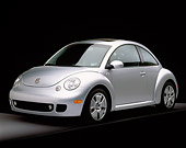 AUT 35 RK0162 01
2002 Volkswagen New Beetle Turbo S Silver 3/4 Front View Studio