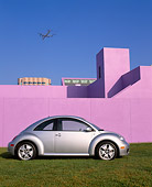 AUT 35 RK0169 01
2002 Volkswagen New Beetle Turbo S Silver Profile View On Grass By Purple Wall