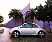 AUT 35 RK0178 01
2002 Volkswagen New Beetle Turbo S Silver Profile By Palm Trees Purple Building