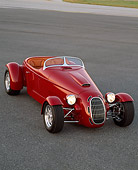 AUT 35 RK0203 02
2002 Torpedo Roadster Custom Red 3/4 Front View On Pavement