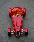 AUT 35 RK0211 04
2002 Torpedo Roadster Custom Red Overhead Head On Shot On Pavement