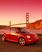 AUT 35 RK0242 03
2002 VW New Beetle GLS Turbo Orange 3/4 Side View By SF Bridge Filtered
