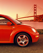 AUT 35 RK0245 03
Close Up 2002 VW New Beetle GLS Turbo Orange Profile By Golden Gate Bridge Filtered