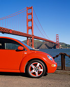 AUT 35 RK0250 03
2002 VW New Beetle GLS Turbo Orange Close Up By Golden Gate Bridge Blue Sky