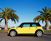 AUT 35 RK0298 03
2002 Mini Cooper S Black And Yellow Side View By Palm Trees Blue Sky