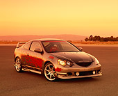 AUT 35 RK0322 08
2002 Acura RSX Nitrous Gray Red Graphics Suspension Techniques 3/4 Front View On Pavement Filtered