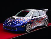 AUT 35 RK0324 03
2002 Ford Focus FR200 Turbo Modify By APC Silver Patriotic Graphics 3/4 Front View Featured In Fast & Furious 2