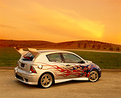 AUT 35 RK0329 05
2002 Ford Focus FR200 Turbo Silver Patriotic Modify By APC 3/4 Rear View On Gravel Grass Hill In Fast & Furious 2