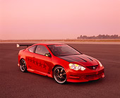 AUT 35 RK0340 04
2002 Acura RSX Type S Red With Graphics Modify By APC Front 3/4 View On Pavement Filtered