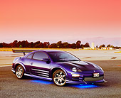 AUT 35 RK0384 01
2002 Mitsubishi Eclipse Violet Blue 3/4 Side View On Bottom Light On Pavement